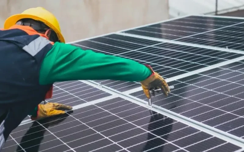 Professional solar panel cleaning on Melbourne rooftop to enhance energy efficiency and output